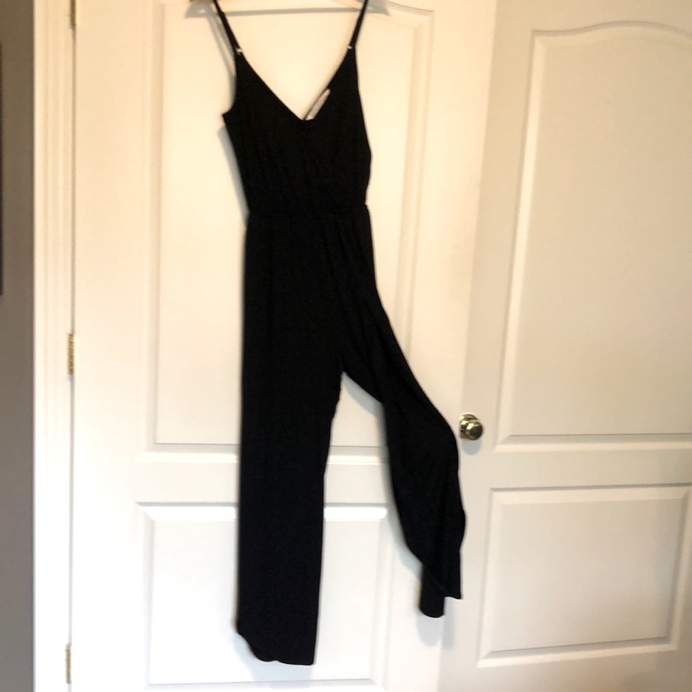 Cupcakes and Cashmere knit jumpsuit. Legs are open to waist. Wrap from back.